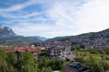 Panorama of Trento. Mountains, clouds, green forests and hiking trails. High quality photo