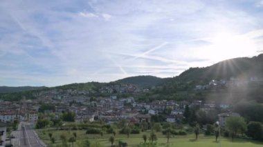 Panorama of Trento. Mountains, clouds, green forests and hiking trails. High quality photo
