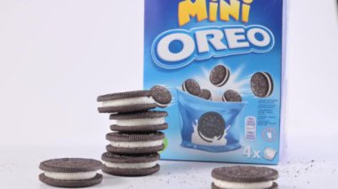 Oreo Flavored Breakfast Cereal, black and white dry breakfast rings. Cup with delicious breakfast and milk. High quality FullHD footage