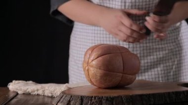 Mortadella. Traditional pork sausage with pistachios or black pepper. Italian delicacy from Bologna. High quality 4k footage
