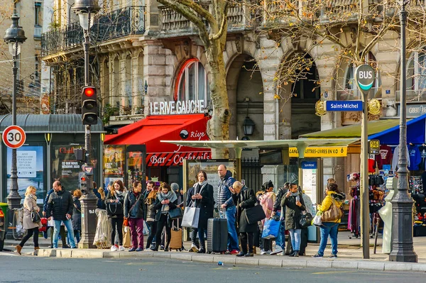 stock image PARIS, FRANCE, JANUARY - 2020 - Long shot urban scene crowd walking at street of paris, france