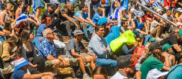 stock image MONTEVIDEO, URUGUAY, NOVEMBER - 2022 - Crowd at street watching uruguay versus corea world cup soccer match