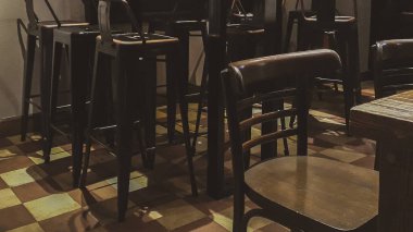 Interior night scene at empty rustic style restaurant, montevideo, uruguay