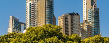 Long distant wide shot contemporary stlye apartment buildings, puerto madero, buenos aires, argentina
