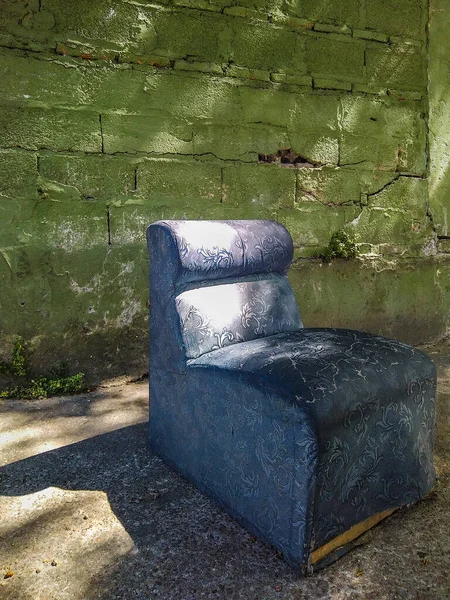 stock image Decorated blue sofa used by homeless at empty sidewalk, montevideo, uruguay