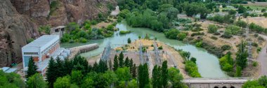 Aerial view of florentino ameghino dam, a gravity dam in chubut province, patagonia, argentina clipart