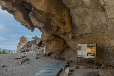 Archaeological site at la buitrera canyon, a striking natural rock formation formed by ancient volcanic activity located in patagonia, chubut province, argentina  clipart