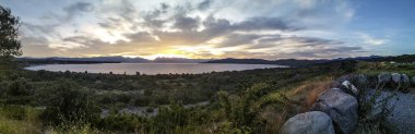 Nahuel huapi lake and andes range mountains at background at sunset time landscape, bariloche, rio negro province, patagonia, argentina clipart