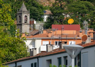 A high angle view overlooking the rooftops of the town of Vila Pouca de Aguiar in Portugal. 	
