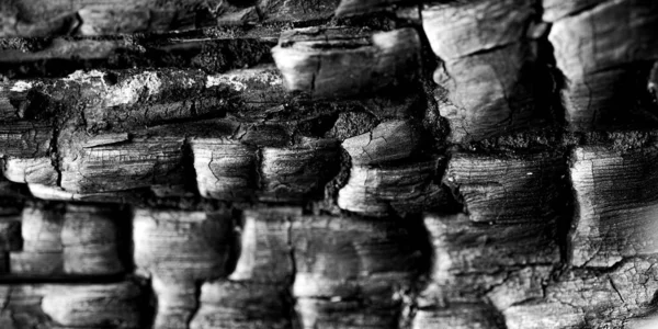 具有炭质背景的古老石墙背景 — 图库照片