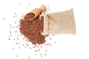 Raw buckwheat in bag isolated on white background