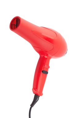 Kızıl saç kurutma makinesi beyaz arka planda izole edilmiş.