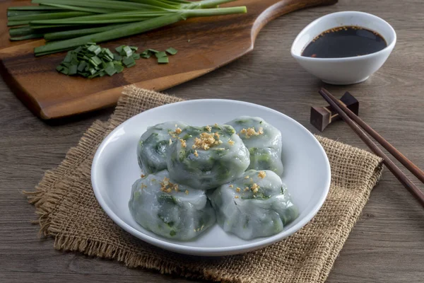 chinese chive dumplings,steamed dumpling stuffed with garlic chives with sauce