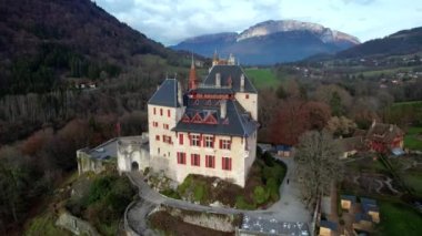 Most beautiful medieval castles of France - fairytale Menthon located near lake Annecy. aerial view