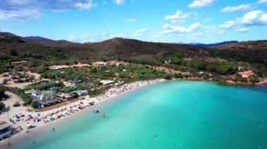 Sardegnia island nature scenery and best beaches. Aerial drone panoramic view of beautiful Porto Taverna beach. Italy summer holidays
