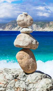 Scenic beaches of beautiful Cephalonia (Kefalonia) island - Agia Eleni with picturesque rocks and stone's piramids. Greece , Ionian islands clipart