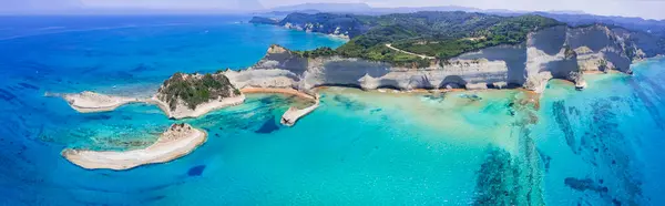 그리스 코르푸의 이오니아 아름다운 케이프 Drastis의 파노라마 북쪽에 바위와 청록색 스톡 이미지