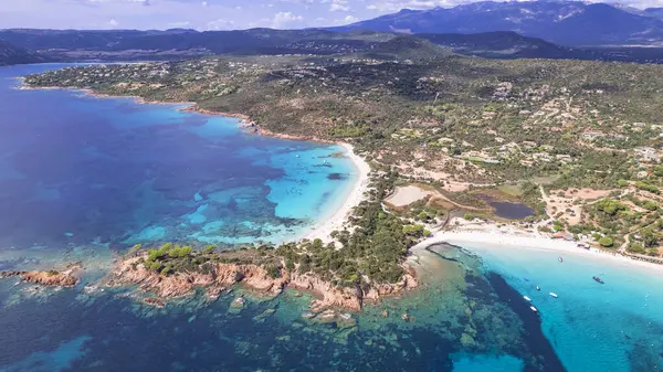 stock image Best beaches of Corsica island. Aerial drone view of beautiful beaches near Porto Vecchio - Palombaggia, Tamaricciu, Folaca with turquoise sea and white san