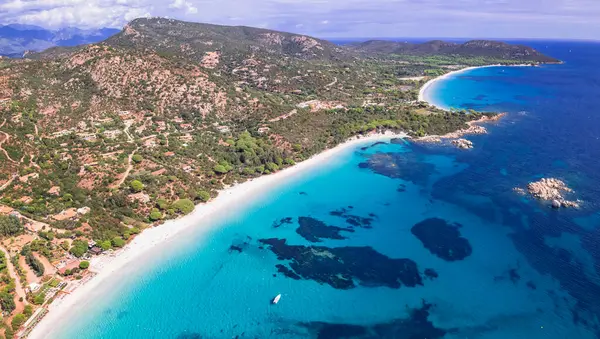 stock image Best beaches of Corsica island. Aerial drone view of beautiful beaches near Porto Vecchio - Palombaggia, Tamaricciu, Folaca with turquoise sea and white san