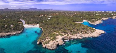 Mallorca island best beaches, Beautiful S'Amarador, park Mondrago near Santanyi. aerial drone panoramic view. Spain travel clipart