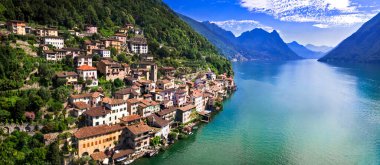 Lugano Gölü İsviçre. En güzel geleneksel köyler, renkli evleri olan manzaralı Gandria Ticino bölgesi, İtalya sınırı. Hava aracı panoramik görünümü