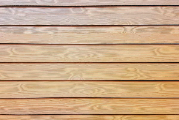 棕色护壁板的图案就像建造房屋时使用的真正的木料 美丽的棕色鞘木墙质感用作背景 带复制空间的假木板纹理背景 — 图库照片