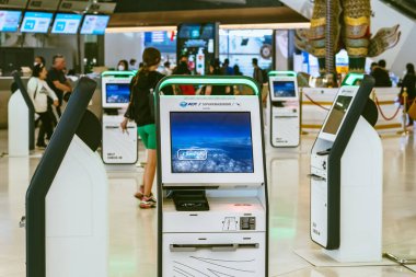 BANGKOK-THAILAND, FEBRUARY 20,2023 : Automated self check-in or self service machine at Suvarnabhumi International Airport. Innovation at the service of people, automation, staff reduction concept.