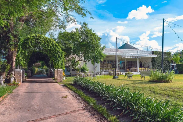 stock image KANCHANABURI-THAILAND,JUNE 30,2023 : Beautiful exterior view of modern coffee cafe in loft style or decoration of cozy restaurant in modern style at Villa La Flora. Coffeehouse or Restaurant exterior