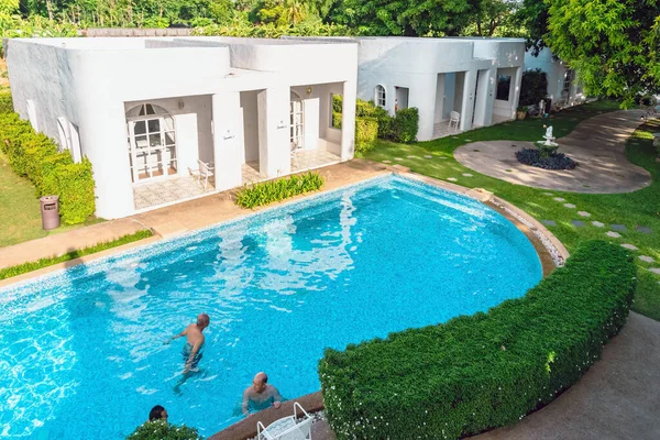 stock image KANCHANABURI-THAILAND,JUNE 30,2023 : Beautiful exterior view of modern resort in loft style or decoration of cozy lodge in modern style at Villa La Flora. Beautiful Resort or Hotel exterior in garden.