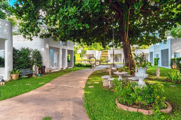 stock image KANCHANABURI-THAILAND,JUNE 30,2023 : Beautiful exterior view of modern resort in loft style or decoration of cozy lodge in modern style at Villa La Flora. Beautiful Resort or Hotel exterior in garden.