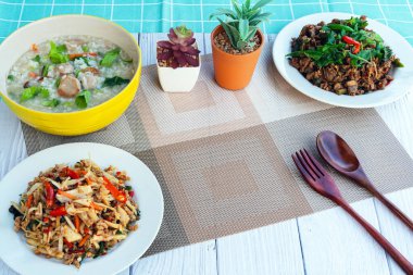 The empty space in the center is for illustrations with Set of dishes for healthy food on white background. Vegetables, fruit, seeds, cereals, beans, spices, superfoods, herbs, Condiment for vegan. clipart