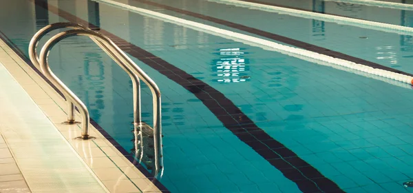 Empty Indoor swimming pool with swim lanes.