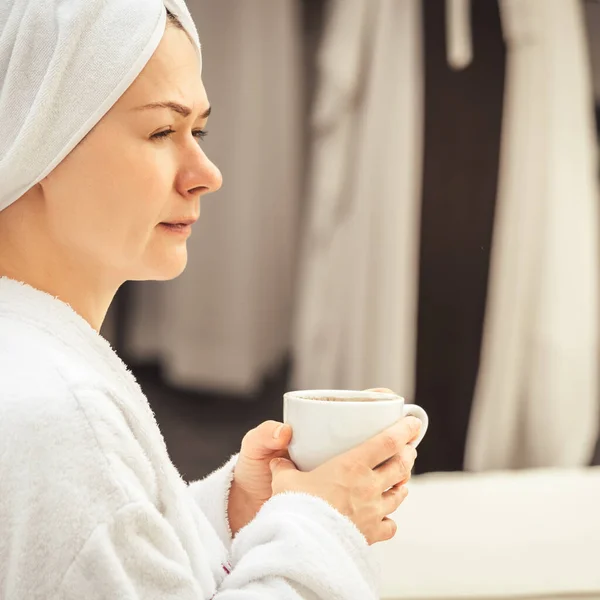 Woman White Bathrobe Towel Lying Sofa Relaxing Tea Roof Hotel — Zdjęcie stockowe