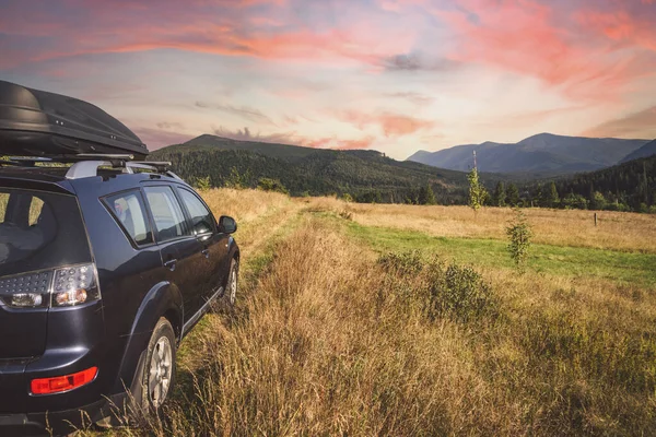 Car Traveling Mountain Road Dramatic Sky — Stock Fotó