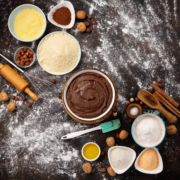 Gluten Free Homemade Dough for Cookies or Bread. Healthy eating, dieting, balanced food concept. Cereals gluten-free, millet, quinoa, almond, buckwheat, spices, honey on brown background. Ancient grain food.