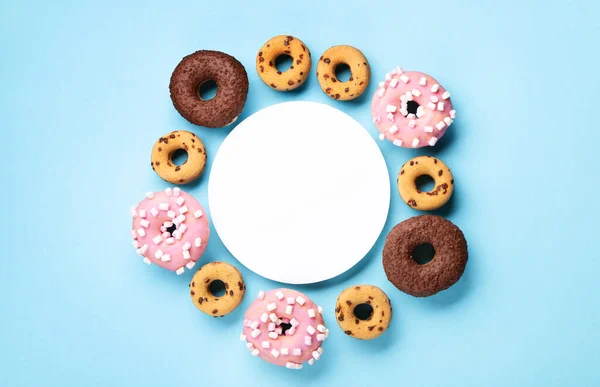 Donuts Doughnuts Chocolate Marshmallow Sugar Sprinkles Blue Background Copy Space — Zdjęcie stockowe