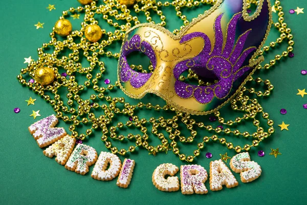 Mardi Gras King Cake Cookies Masquerade Festival Carnival Mask Gold Imágenes de stock libres de derechos