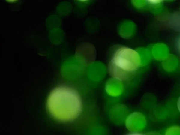 Grön Bokeh Svart Bakgrund Abstrakt Suddig Färgglada Glitter Ljusfläckar Stockfoto