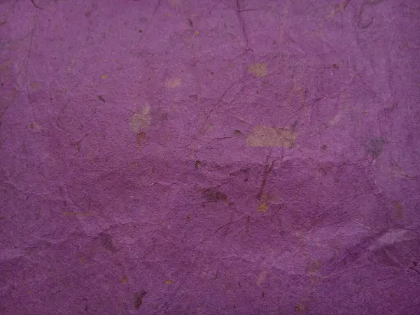 Purple rice paper or mulberry texture background.