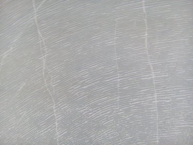 Çatlak plastik doku arka planı. Eski beyaz plastik yüzeyi kapat.