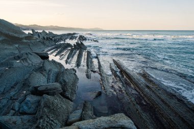 Flysch near the Basque coast of Zumaia, beautiful natural maritime landscape of sedimentary rocks.