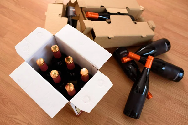 stock image Cardboard box with quality wine bottles sent by post