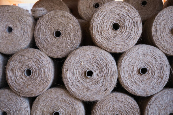 Rolls of rope of various thicknesses.