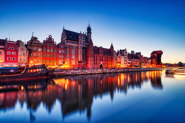 Illuminated Gdansk Old Town with Calm Motlawa River at Dusk, Poland, Europe, Poland, Europe
