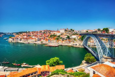 Porto Aerial Cityscape with Luis I Bridge and Douro River during a Sunny Day, Portugal   clipart