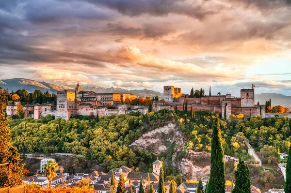 stock image Alhambra Fortress Aerial View at Sunset with Amazing Clouds, Granada, Andalusia, Spain