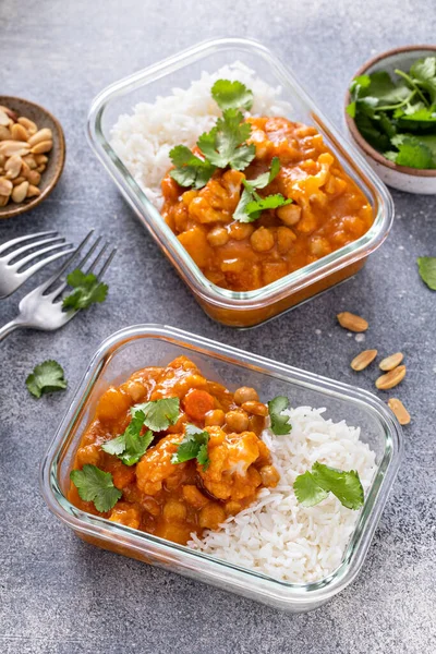 Vegan meal prep idea cauliflower and chickpeas curry with rice