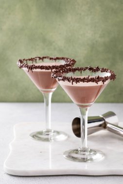 Chocolate martini with chocolate sprinkles on the glass rim