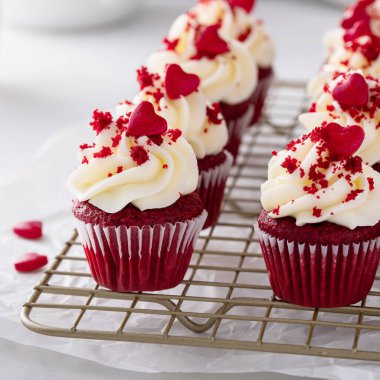 Red velvet mini cupcakes with cream cheese frosting, homemade dessert idea for Valentines day