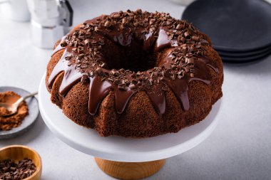 Chocolate bundt cake drizzled with chocolate ganache glaze